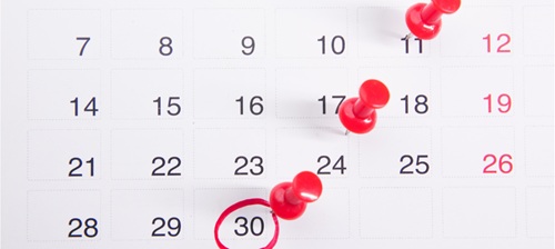 Image of a calendar with a day circled in red